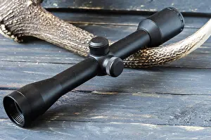Telescope Prints: Optical sight for hunting game. Optical sight and deer horn