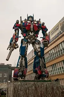 Tune Prints: An Optimus Prime like Transformer made from car parts on the Beijing Tuning Street