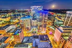 Orlando, Florida, USA aerial cityscape towards Lake Eola at dusk