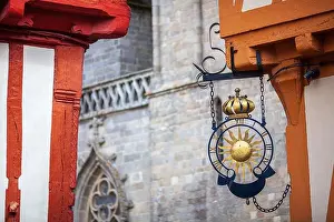 Shop Sign Prints: Ornate clockmaker's sign, featuring a sun and crown