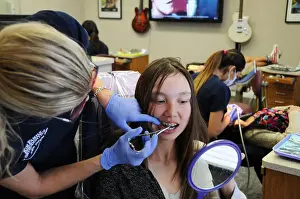 Concentrate Prints: An orthodontist is a type of dentist who specializes in straightening crooked teeth