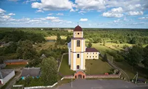 Orthodox church on forest background aerial drone view
