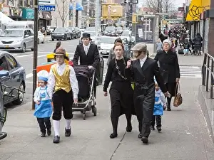 Subculture Prints: The orthodox Jewish community in Borough Park Brooklyn celebrates the festive holiday of Purim by wearing costumes