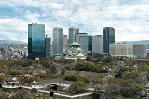Osaka Castle with Osaka business park financial district in Osaka city, Japan