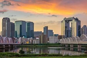 Images Dated 23rd August 2015: Osaka, Japan skyline at Umeda from across the Yodogawa River in the early morning