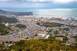 Otaru, Hokkaido, Japan town cityscape over Ishikari Bay at dusk