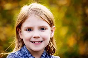 Looking At The Camera Prints: Outdoor portrait of a girl with blue eyes and blond hair in autumn; Edmonton