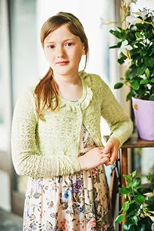 Little Prints: Outdoor portrait of pretty 9-10 year old girl, wearing summer dress