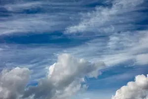 Cloud Sky Prints: A full outdoor shot of a partly cloudy blue sky. Brussels