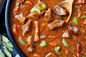 Guinness Prints: overhead view of traditional irish beef and beer stew with carrots