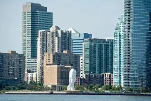 New Jersey Prints: Overlooking the Hudson River, an 80-foot-tall waterfront sculpture by Spanish artist Jaume Plensa in Jersey City