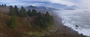 The Pacific Ocean crashes against the amazing coastline of Northern California in Klamath. This region is home to the world's most beautiful forests