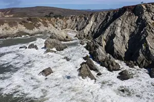 The Pacific Ocean crashes against the rugged and scenic seashore of Northern California. This region is known for its amazing coastal landscapes
