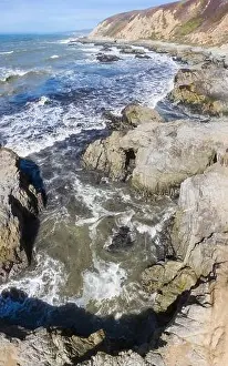 The Pacific Ocean crashes against the rugged and scenic seashore of Northern California. This region is known for its amazing coastal landscapes