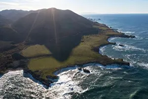 The Pacific Ocean meets the beautiful and rocky shoreline of Central California, near Morro Bay. This scenic region is a popular vacation destination