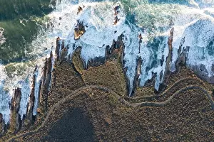 The Pacific Ocean meets the beautiful and rocky shoreline of Central California, near Morro Bay. This scenic region is a popular vacation destination