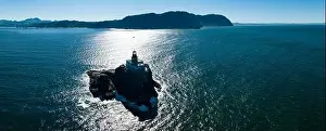 The Pacific Ocean surrounds the deactivated Tillamook Rock Lighthouse off the scenic Oregon coast. The historic lighthouse was built in 1880