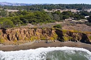 Aerial Landscape Collection: The Pacific Ocean washes against the rocky, scenic seashore of Central California in Morro Bay