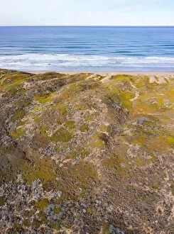 Aerial Landscape Collection: The Pacific Ocean washes against the seashore of Central California in Morro Bay