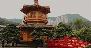 Tang Prints: Pagoda in traditional Chinese garden with red bridge, lush green trees