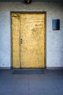 Peeling Paint Prints: Painted in gold door with a blue white wall