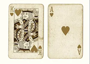 Deck Prints: A pair of vintage black jack playing cards in sepia on a pale cream background.