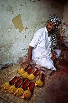 Alleyway Prints: Pakistan South Punjab Bahawalpur Khussa embroidered gold shoe maker
