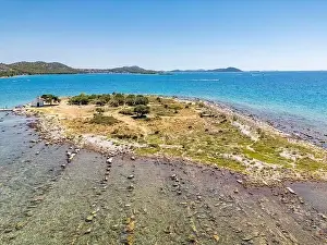 Pakostane, Croatia - July 27, 2024: Little island with little chapel near Pakostane city in Croatia