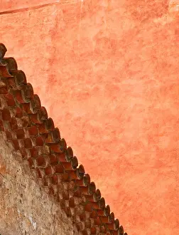 City Break Prints: Pan tiled roof against painted red wall in Old Havana Cuba