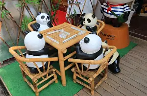 Guilin Prints: Pandas play mahjong display on West Street in Yangshou China