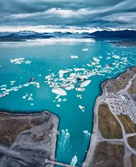 Panorama aerial view of Jokulsarlon glacier lagoon with iceberg floating on gloomy day in Vatnajokull national park