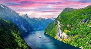 Panorama of breathtaking view of Sunnylvsfjorden fjord and famous Seven Sisters waterfalls, near Geiranger village in western Norway