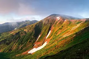 Panorama of Chornohirsky range in Ukrainian Carpathians on sunrise time. Hightest mountains in Ukraine in spring season. Landscape photography