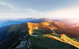 Panorama of Chornohirsky range in Ukrainian Carpathians on sunrise time. Hightest mountains in Ukraine in spring season. Landscape photography