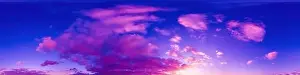 Panorama of a dark blue sunset sky with golden Cumulus clouds. S