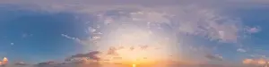 Panorama of a dark blue sunset sky with pink Cirrus clouds