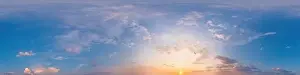 Panorama of a dark blue sunset sky with pink Cirrus clouds