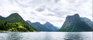 Images Dated 15th July 2017: Panorama of dramatic evening view of Hjorundfjorden fjord near Urke village, Norway