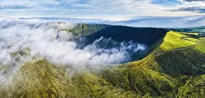 Panorama of drone green sunrise landscape of volcano Gordo caldera in Faial island - Azores, Portugal