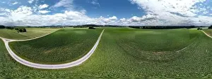 Panorama landscape from the air in the Bavarian Danube area with cloudy summer sky