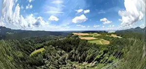 Panorama landscape from the air in the Bavarian Danube area with cloudy summer sky