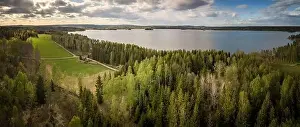 Tones Prints: Panorama of a landscape in cloudy weather a lake in sweden