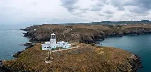 Panorama landscape of the Pembrokeshire coast with the historic Strumble Head Lighthouse