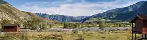 Siberia Prints: Panorama of a mountain river in a wide valley in the background of rocky mountains in summer on a sunny day