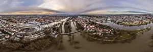 Stone Bridge Prints: Panorama of Regensburg city in Bavaria with the river Danube the cathedral and the stone bridge during flood