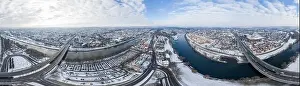 Panorama of Regensburg city in Bavaria with the river Danube the cathedral and the stone bridge in winter with snow