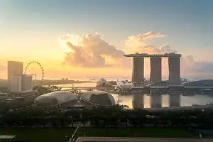 Panorama of Singapore business district skyline and office skyscraper during sunrise in Marina bay, Singapore. Asian tourism, modern city life, or bus