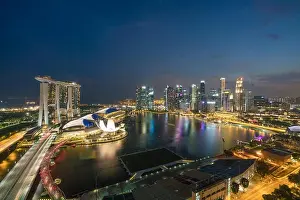 Panorama of Singapore business district skyline and Singapore skyscraper in night at Marina Bay, Singapore. Asia