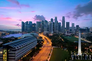 Panorama of Singapore business district skyline and Singapore skyscraper with War Memorial Park in night at Marina Bay, Singapore