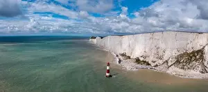 Panorama view of the Beachy Head Lighthouse in the English Channel and the white cliffs of the Jurassic Coast